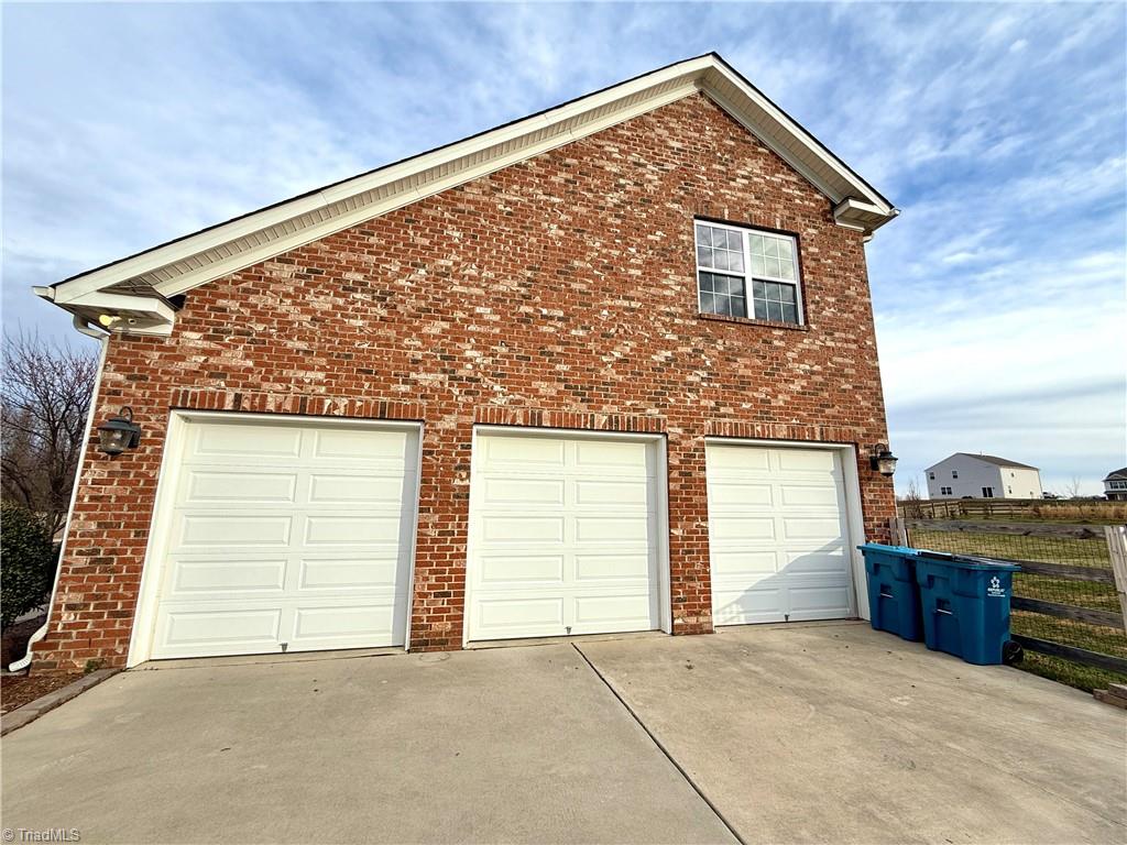 3403 Garrick Trace Browns Summit, NC 27214 - Photo 3 of 49 3-Car Garage