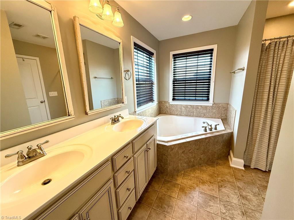 3403 Garrick Trace Browns Summit, NC 27214 - Photo 33 of 49 Primary Bathroom Suite