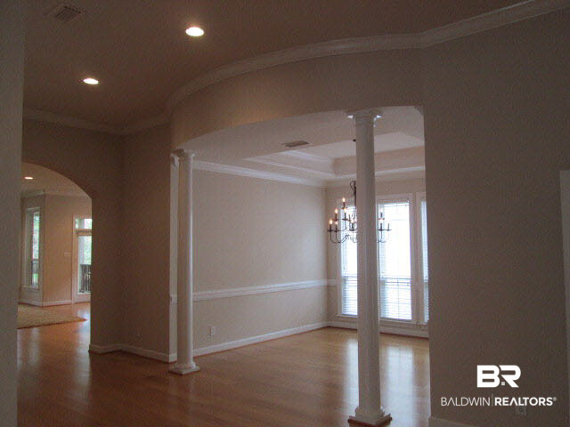 107 Chestnut Ridge Fairhope, AL 36532 - Photo 3 of 20 Arched entrance to dining room with columns