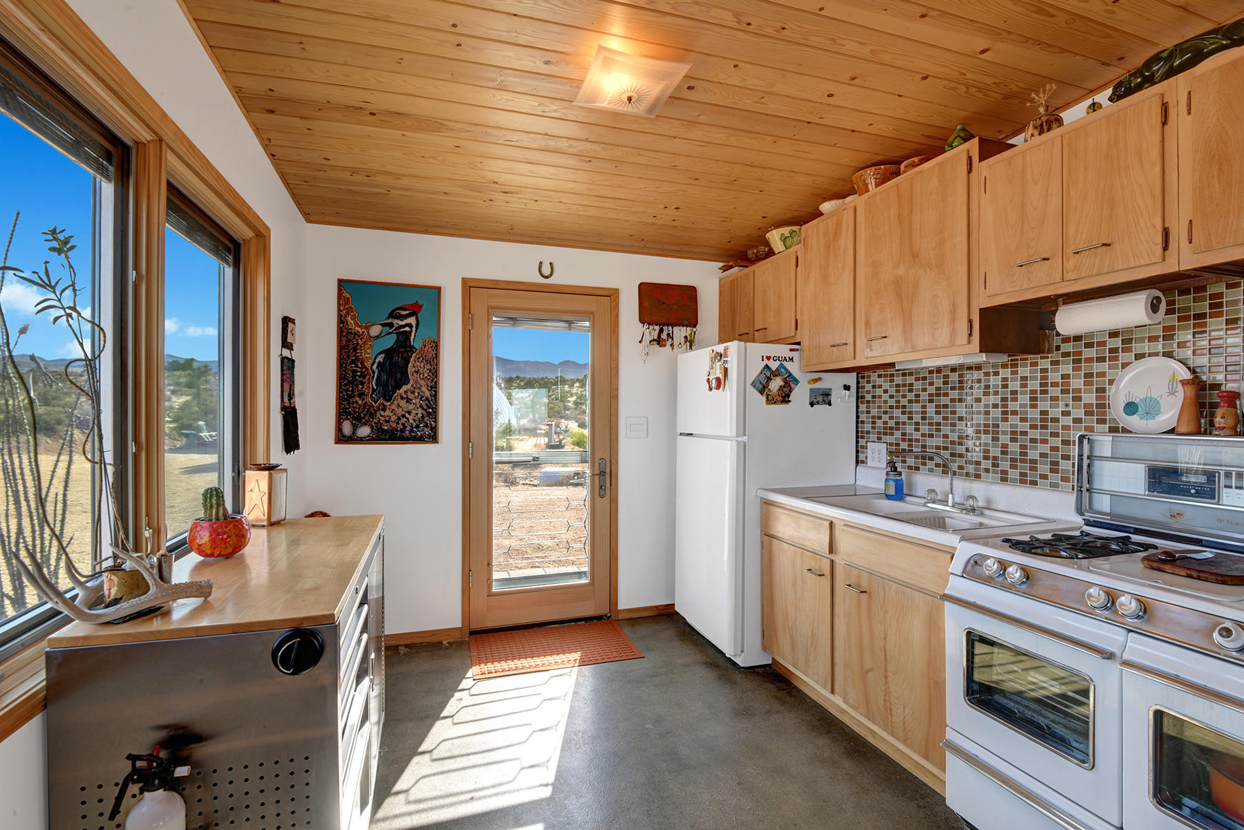 751 Atomic Ranch Road Landers, CA 92285 - Photo 9 of 47 CABIN KITCHEN REVERSE THROUGH MLS