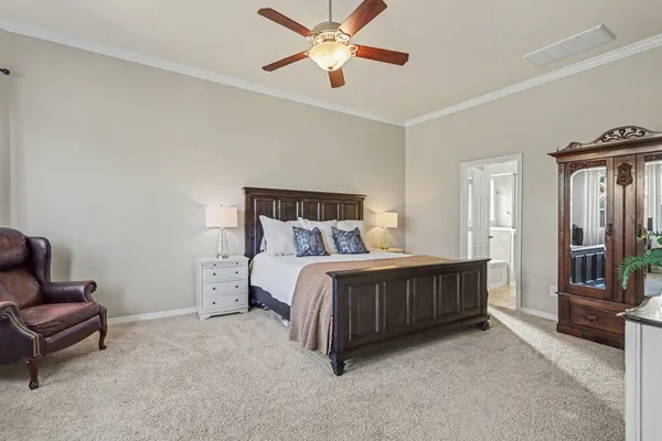 a bedroom with a bed and furniture