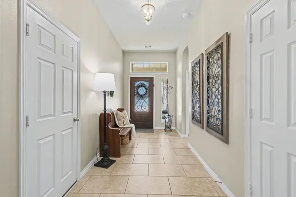 a view of a hallway with a furniture