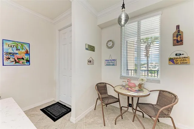 a kitchen with a sink a stove and cabinets
