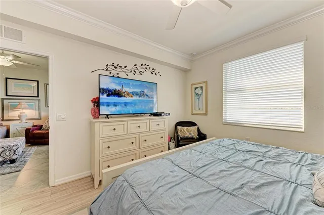 a bedroom with a bed and furniture