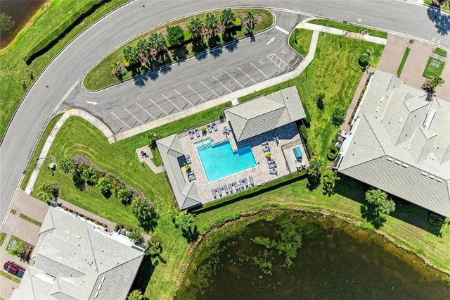 a view of a swimming pool with an ocean view