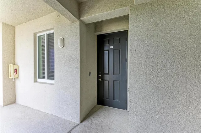 wooden floor with table and chairs