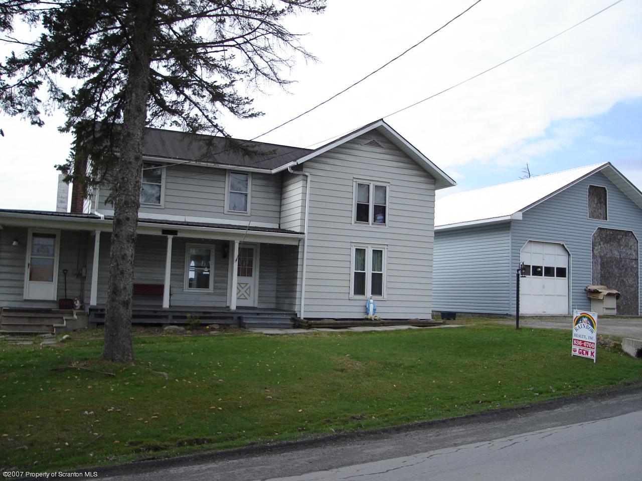 244 Sheldon Hill Road Springville, PA 18844 - Photo 2 of 7 a front view of house with yard and green space