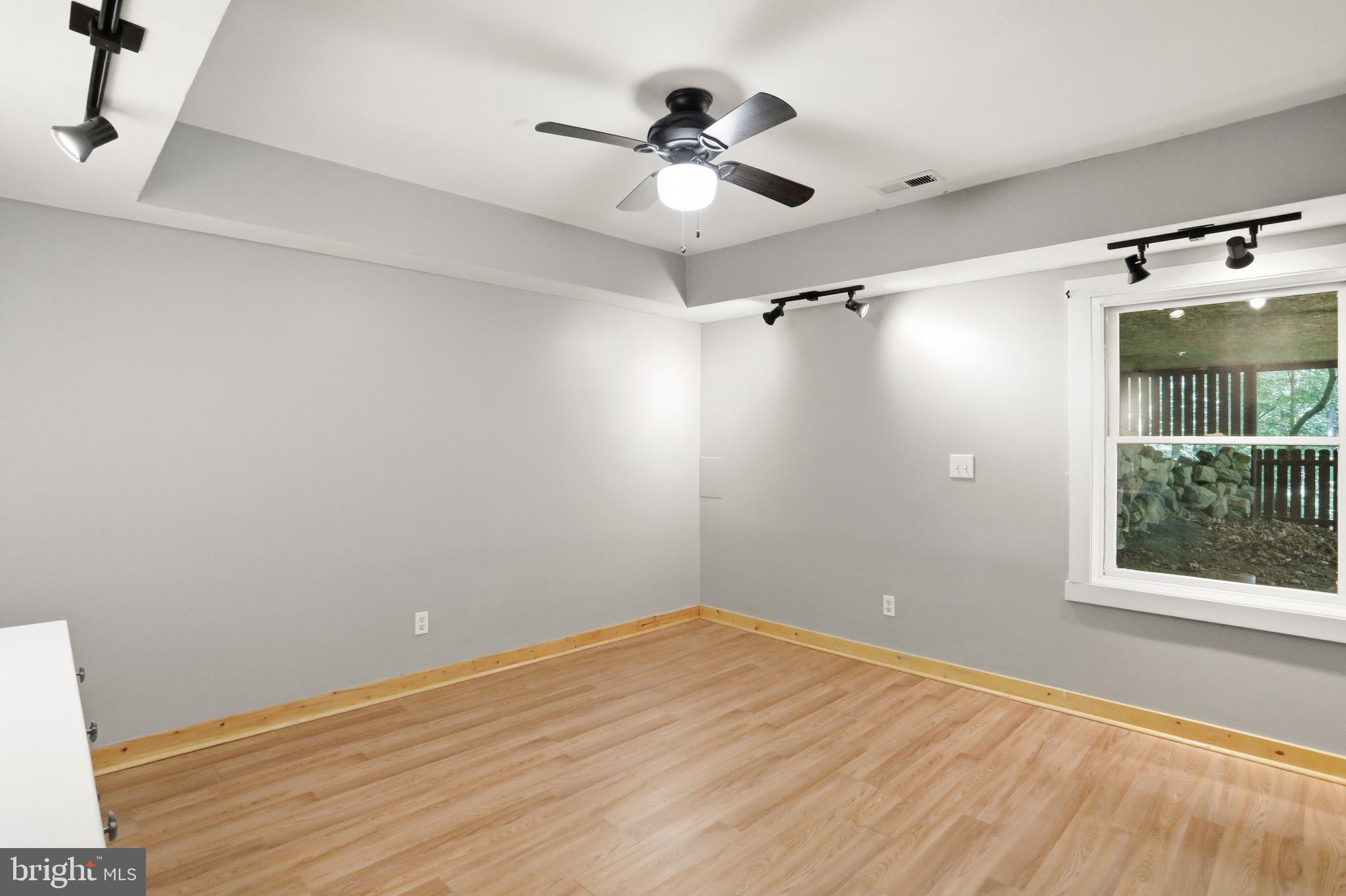 1400 Core Road Romney, WV 26757 - Photo 35 of 73 an empty room with a window and a fan