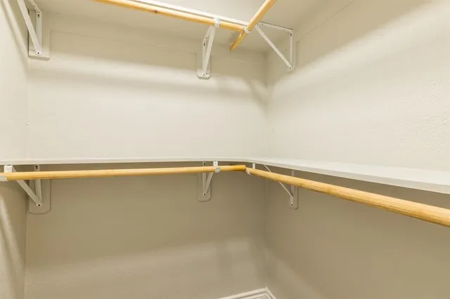 a view of a room with racks on the wall