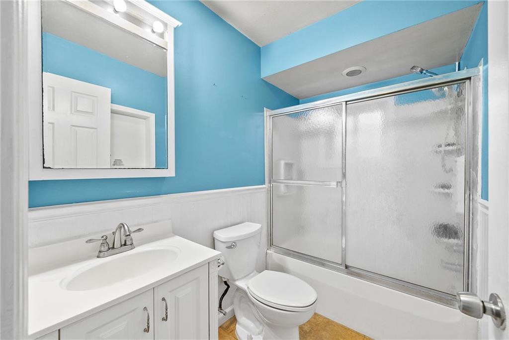 20 Haberman Avenue Pittsburgh, PA 15211 - Photo 17 of 22 a bathroom with a sink a toilet and shower