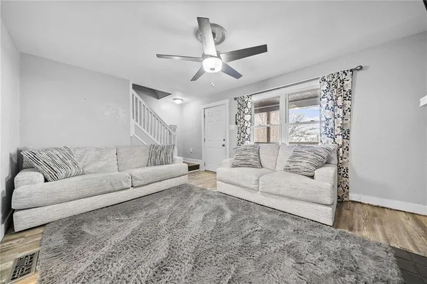 a living room with furniture and a couch