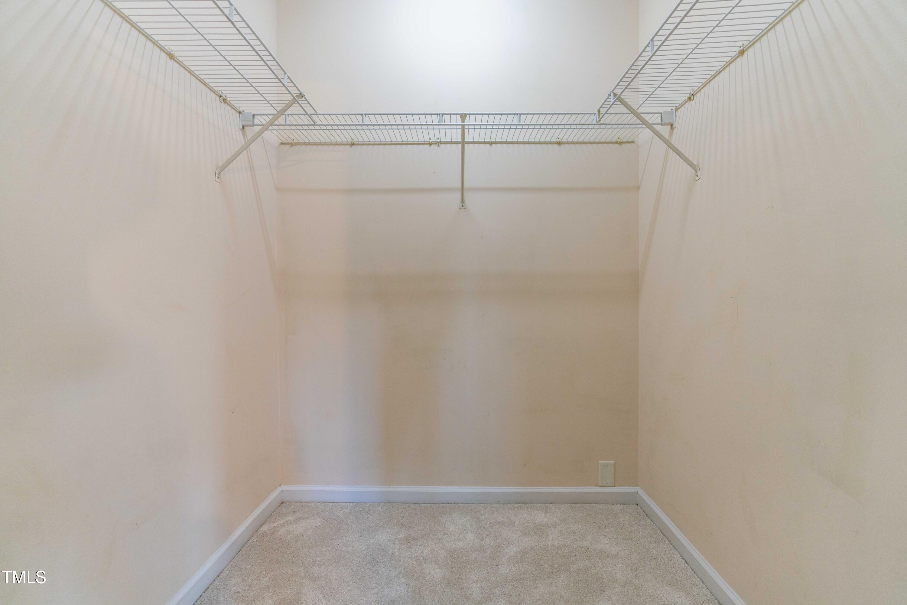 2101 Piney Brook Road, Unit 105 Raleigh, NC 27614 - Photo 16 of 24 a view of an empty walk in closet