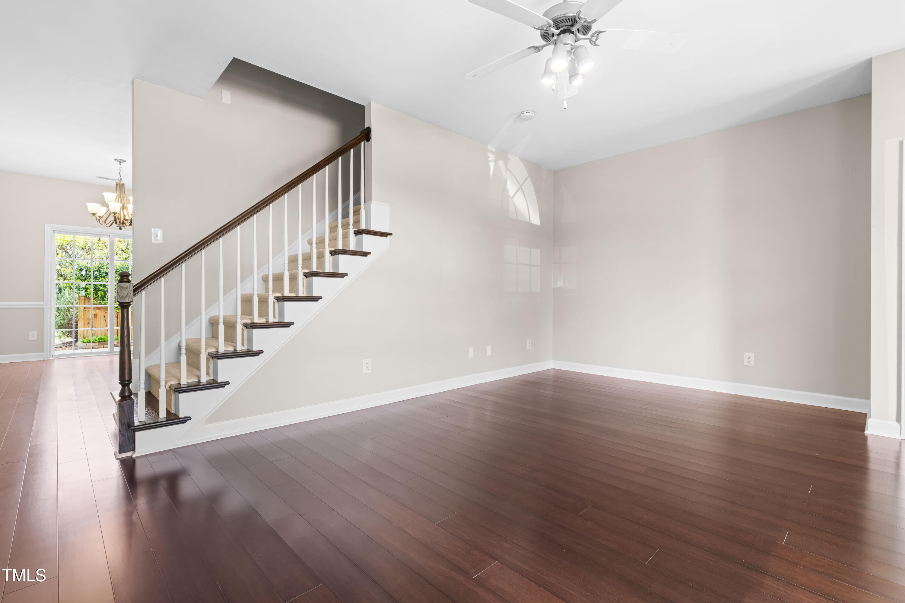 2101 Piney Brook Road, Unit 105 Raleigh, NC 27614 - Photo 5 of 24 a view of entryway and hall with wooden floor