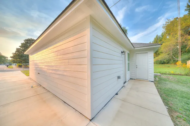a view of a back yard of the house
