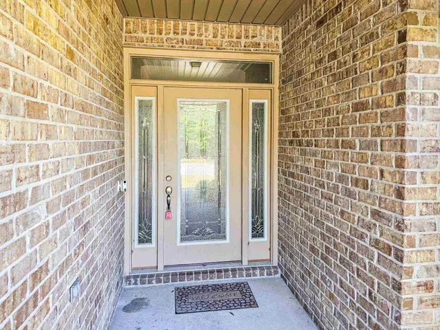 a view of a door and a street