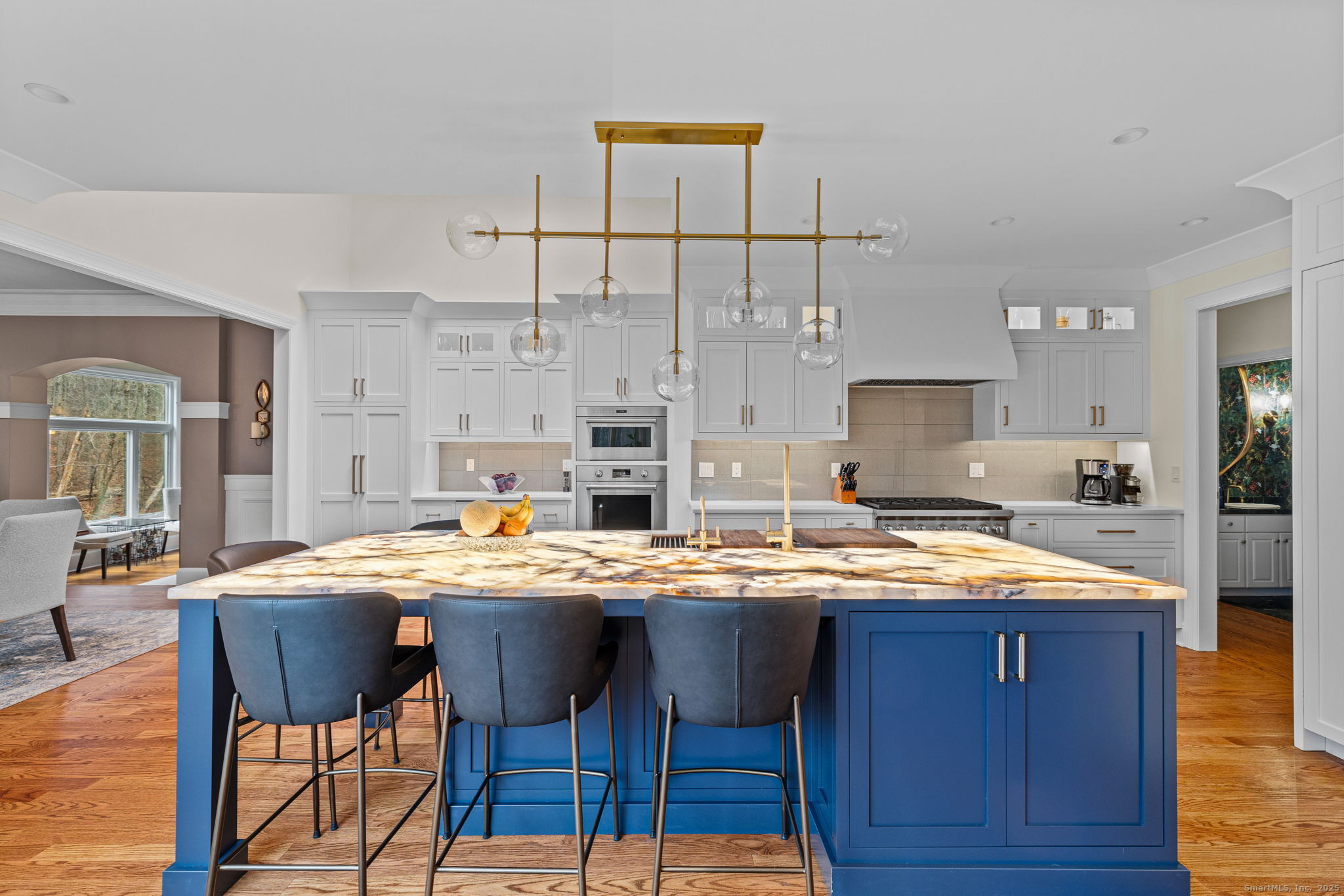 40 Hull Place Ridgefield, CT 06877 - Photo 11 of 40 a kitchen with stainless steel appliances granite countertop a sink and cabinets
