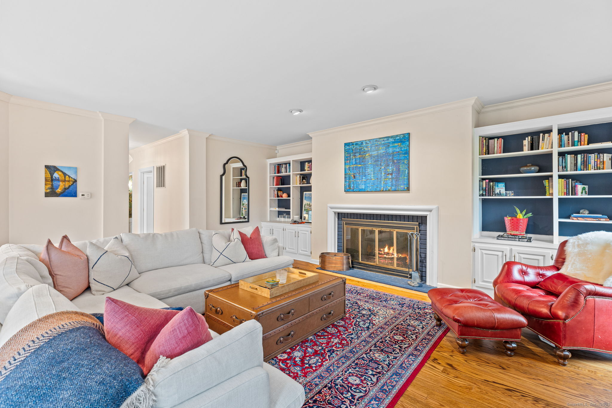 40 Hull Place Ridgefield, CT 06877 - Photo 17 of 40 a living room with furniture and a fireplace