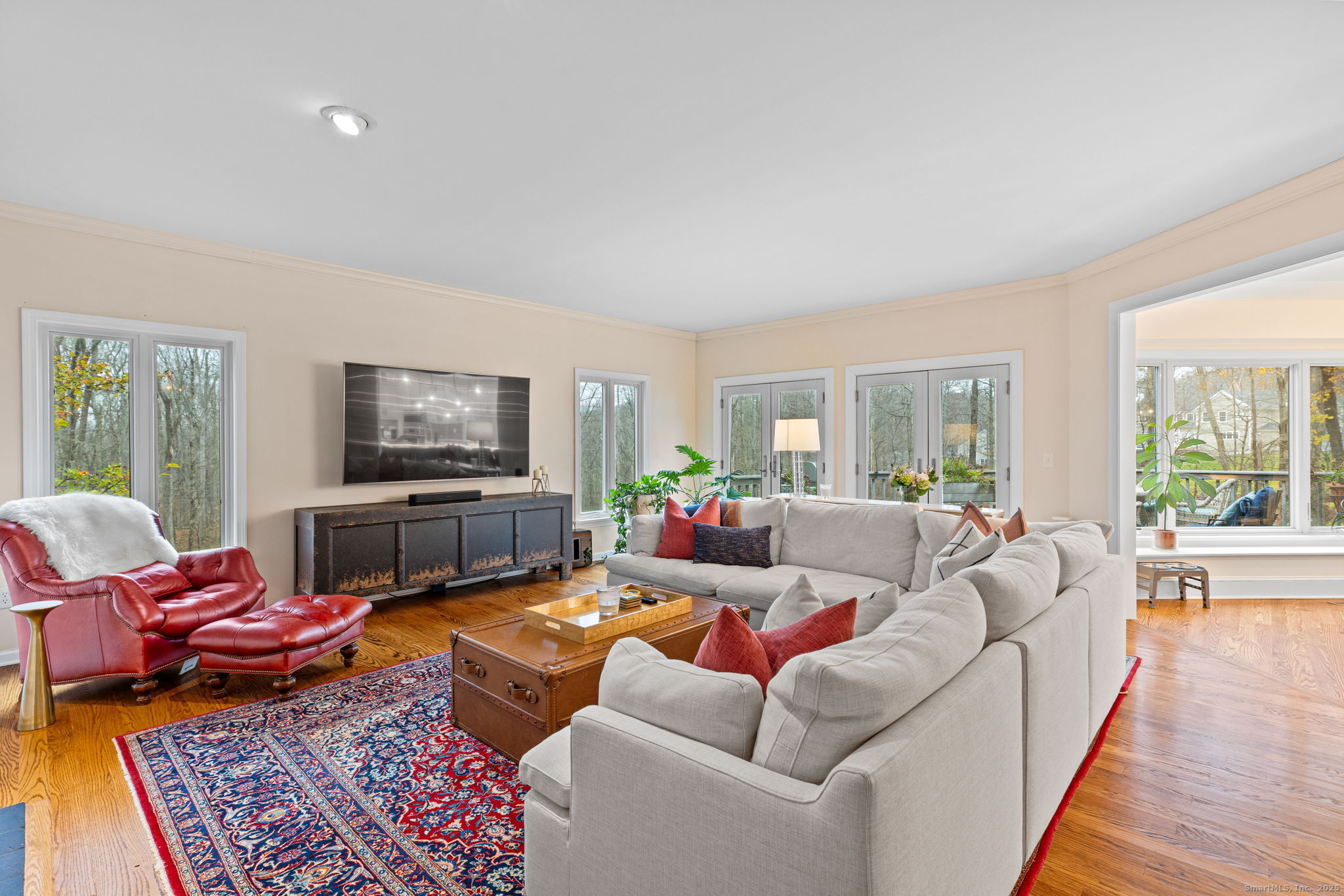 40 Hull Place Ridgefield, CT 06877 - Photo 18 of 40 a living room with furniture or couch and a flat screen tv