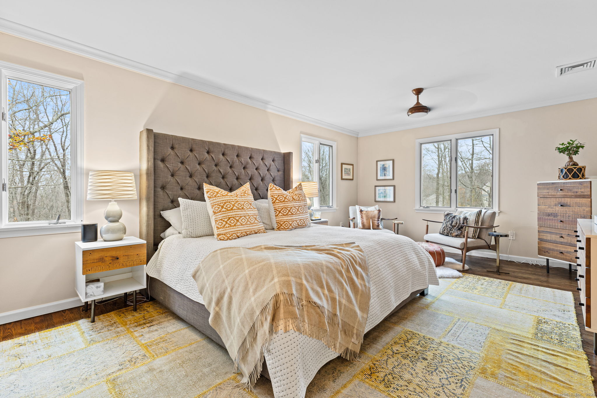 40 Hull Place Ridgefield, CT 06877 - Photo 20 of 40 a spacious bedroom with a bed and a window