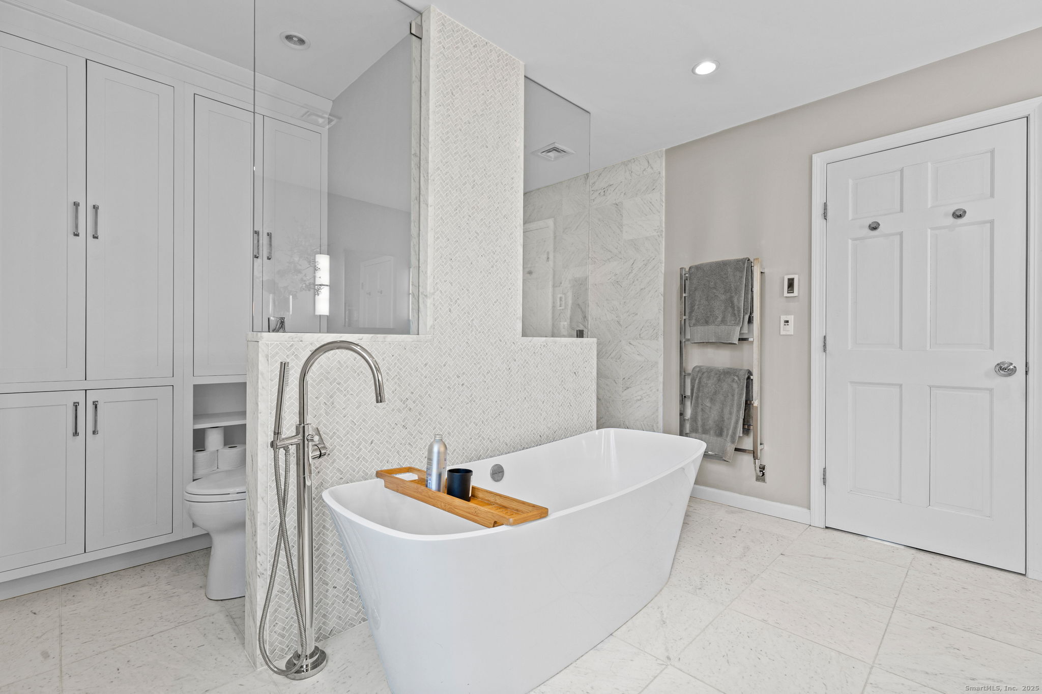 40 Hull Place Ridgefield, CT 06877 - Photo 23 of 40 a bathroom with a bathtub and shower