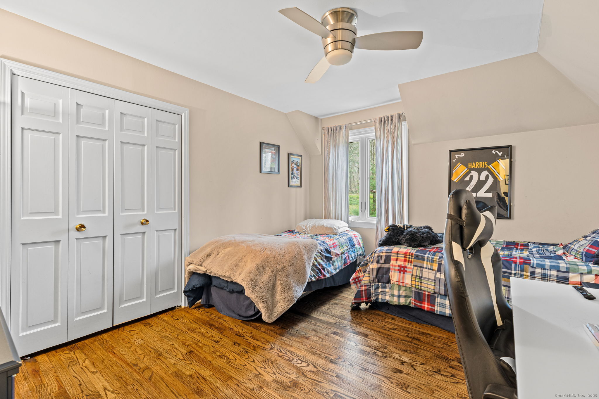 40 Hull Place Ridgefield, CT 06877 - Photo 29 of 40 a bedroom with bed and a window