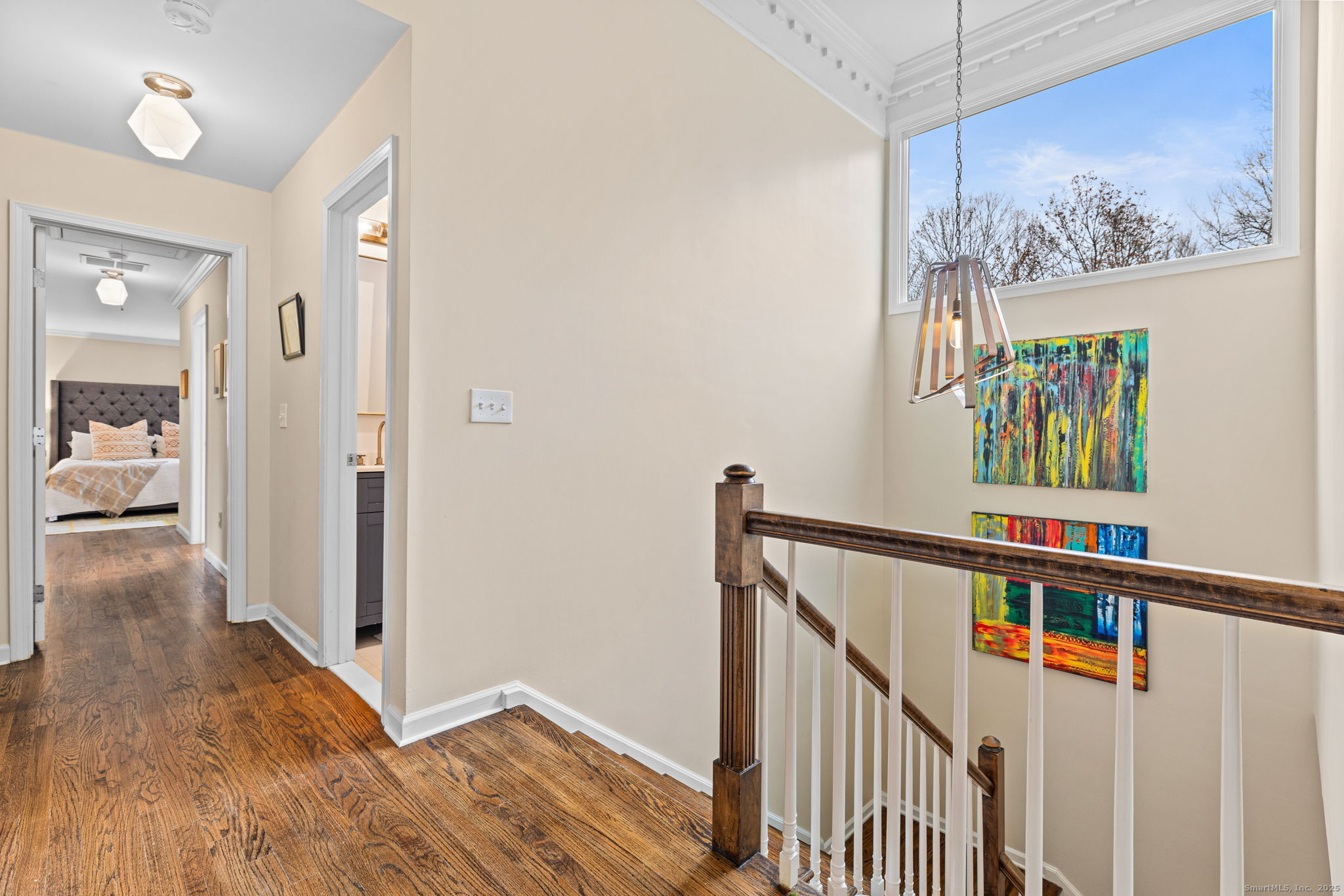 40 Hull Place Ridgefield, CT 06877 - Photo 32 of 40 a view of a hallway with wooden floor and stairs