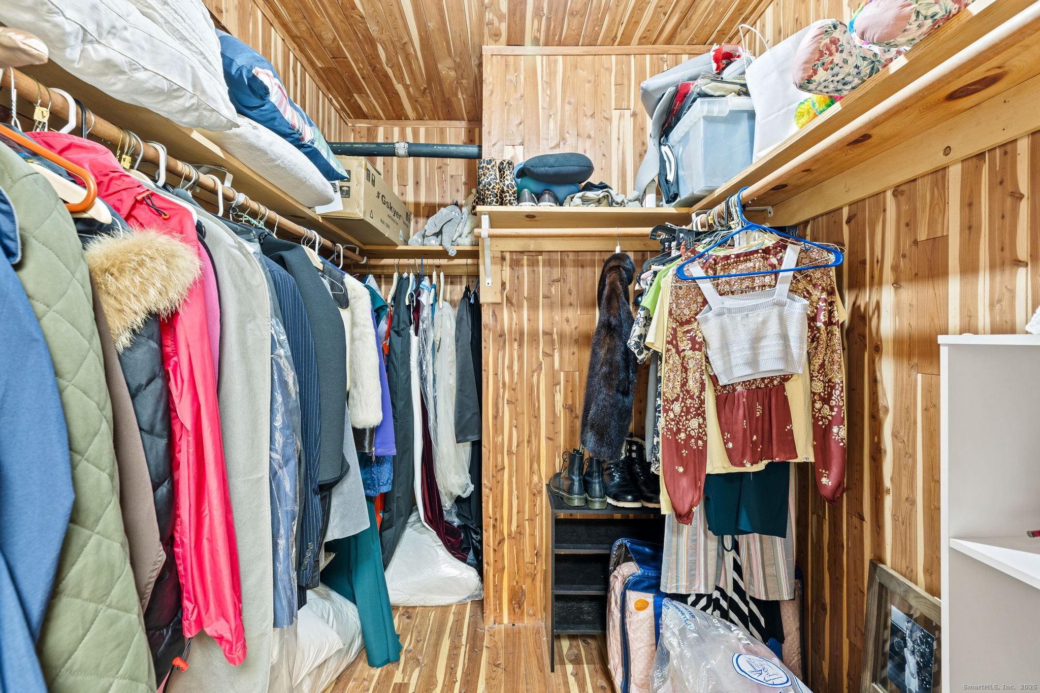 40 Hull Place Ridgefield, CT 06877 - Photo 35 of 40 a view of walk in closet with clothes