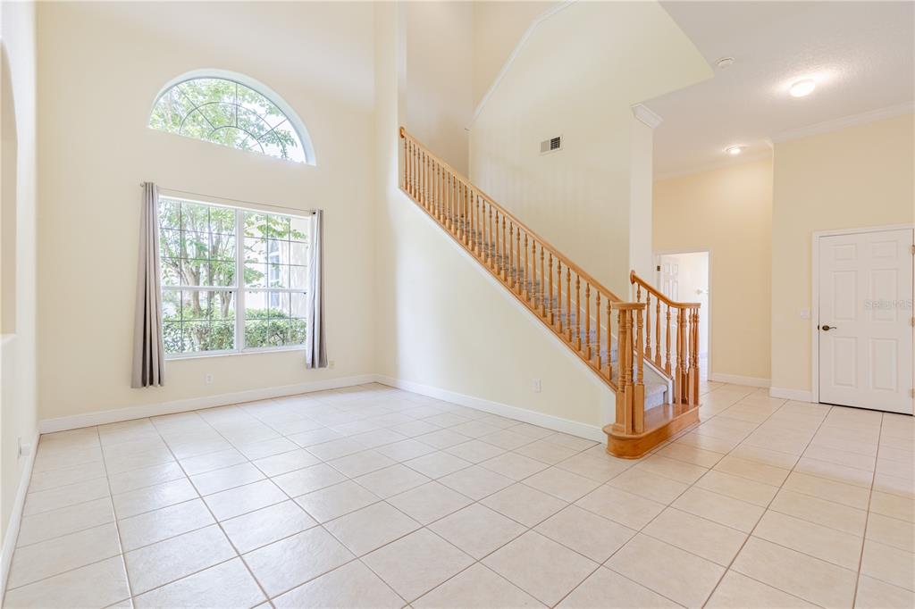 2718 Knightsbridge Road Clermont, FL 34711 - Photo 53 of 72 a view of entryway and hall with a window