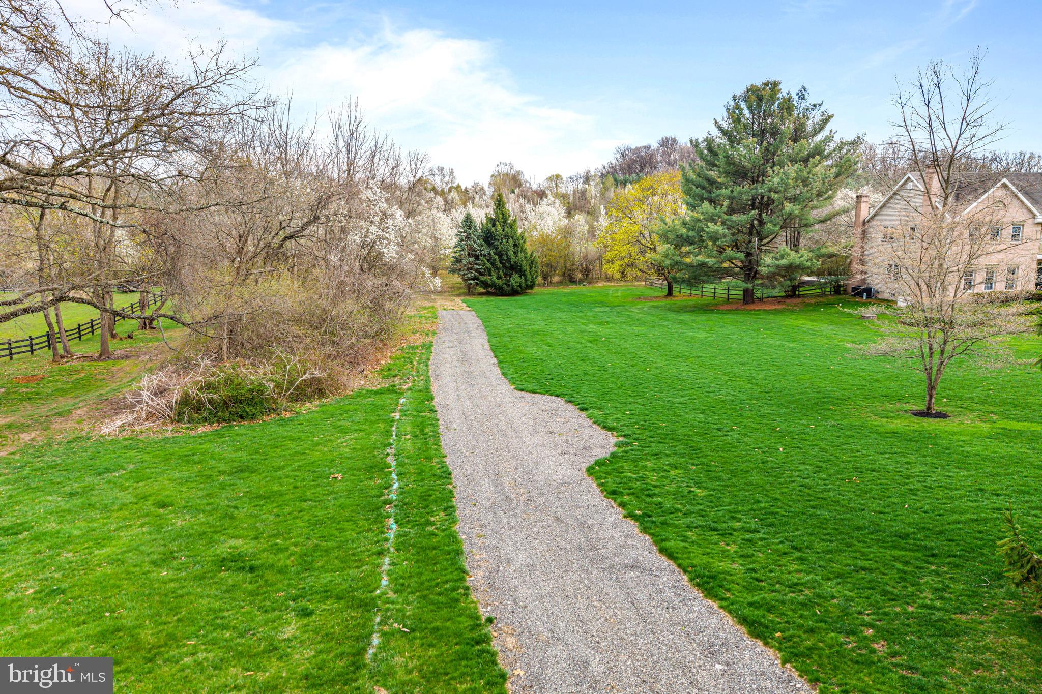 4441 Fell Road Doylestown, PA 18902 - Photo 3 of 7 a view of a park with large trees