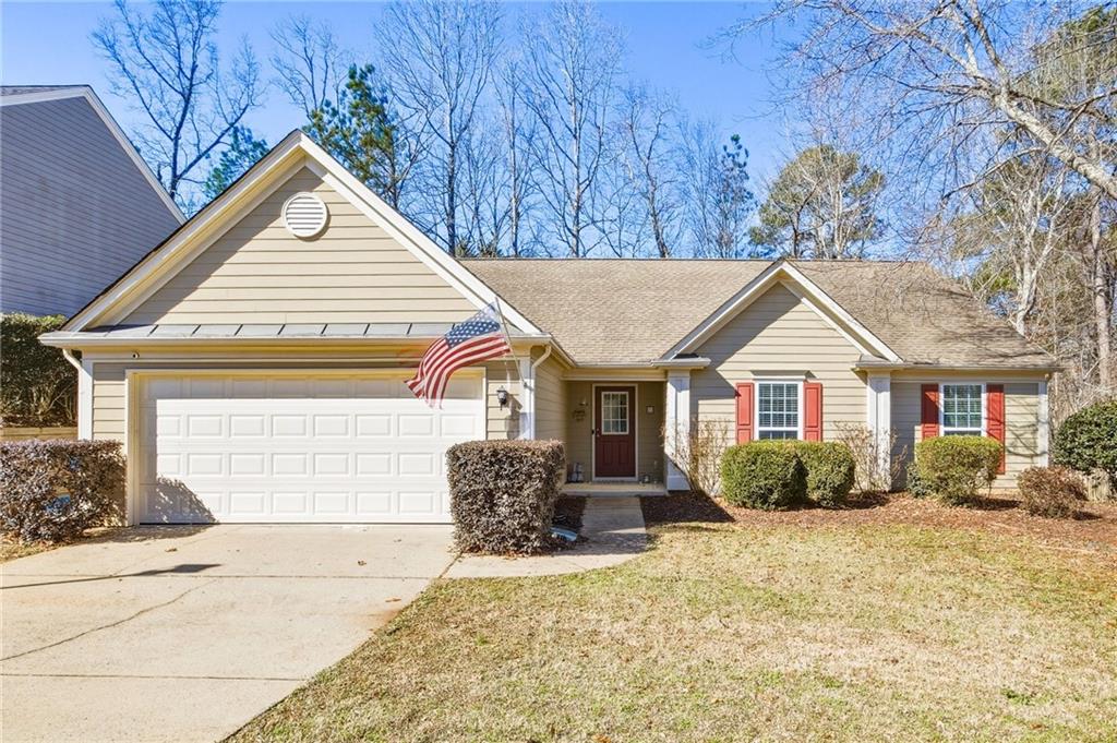 2407 Traywick Chase Alpharetta, GA 30004 - Photo 1 of 1 a view of a house with a yard