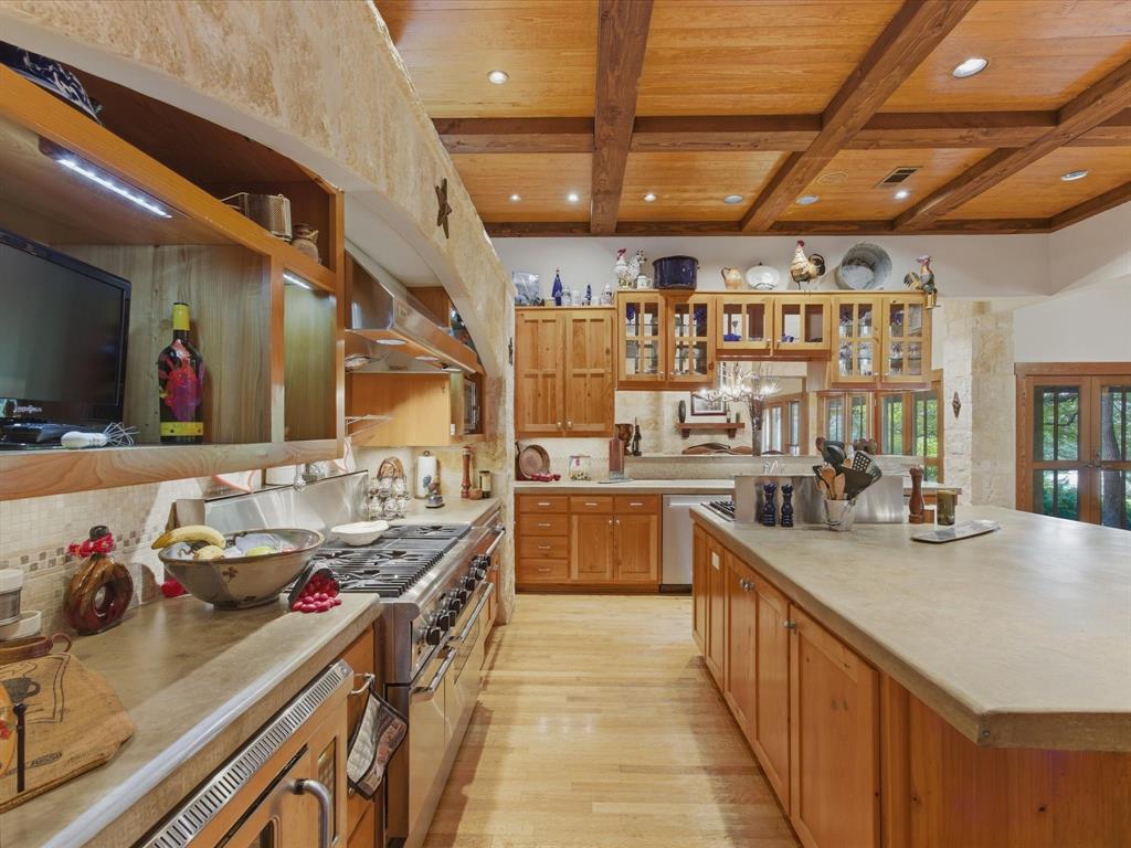 151 Trinity Bluffs Road Aledo, TX 76008 - Photo 15 of 40 a kitchen with lots of counter top space