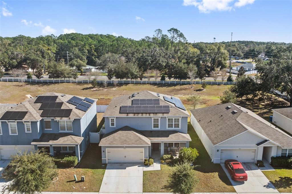 1526 White Hawk Way Groveland, FL 34736 - Photo 33 of 40 a view of houses with a swimming pool