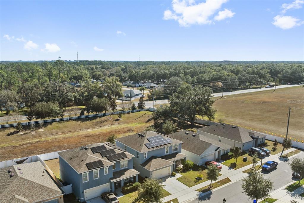 1526 White Hawk Way Groveland, FL 34736 - Photo 34 of 40 an aerial view of a city with lots of residential buildings