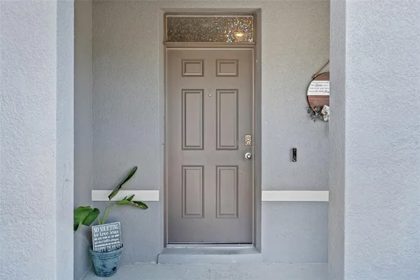 a living room with furniture and window