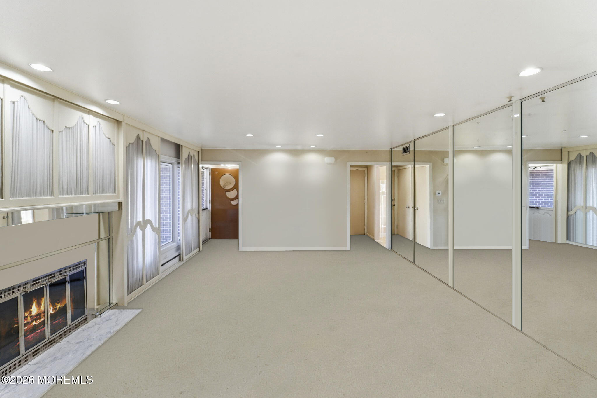 440 Broadway Road Freehold, NJ 07728 - Photo 21 of 50 a view of an empty room with fireplace and a window