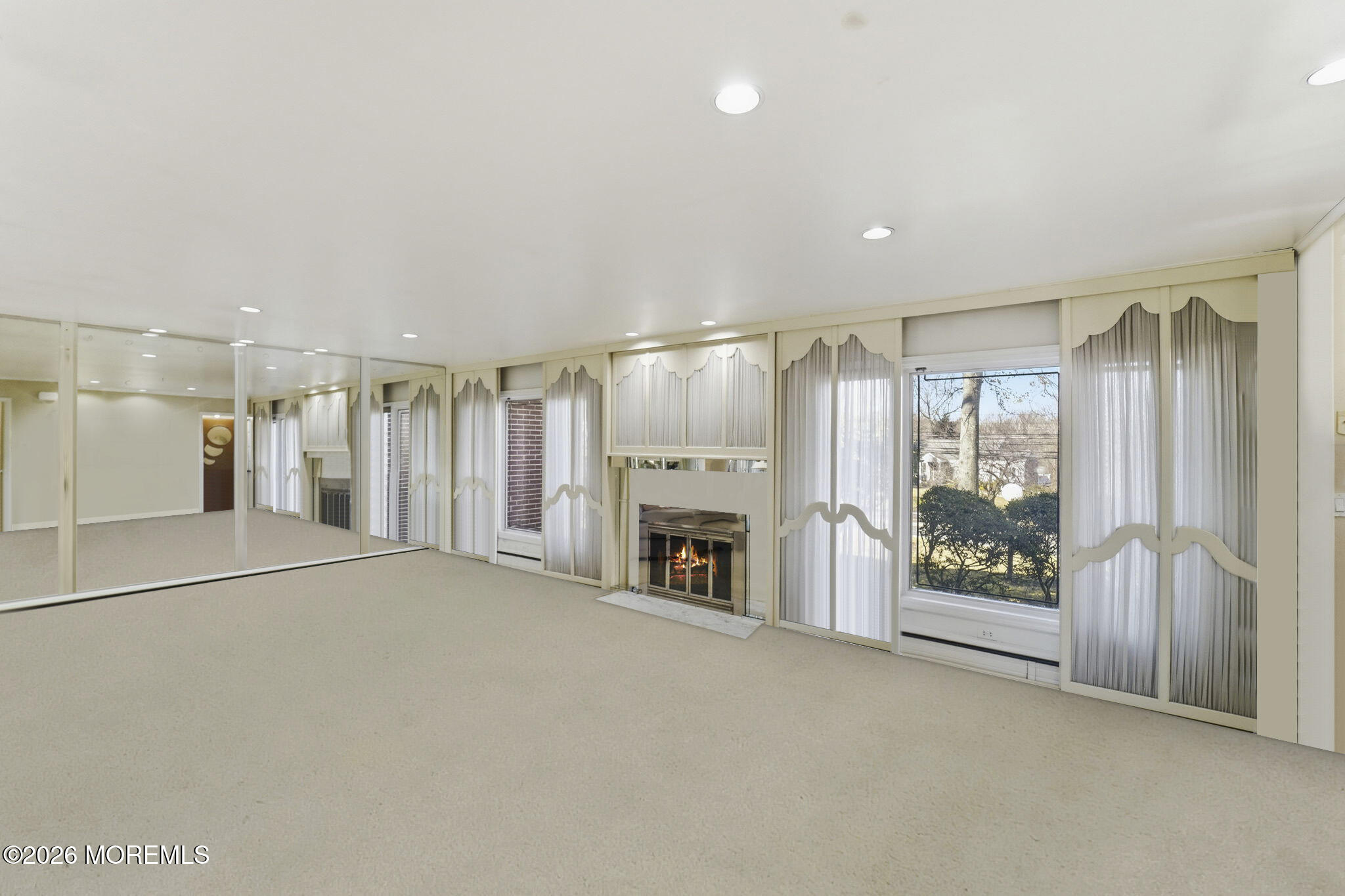440 Broadway Road Freehold, NJ 07728 - Photo 24 of 50 a view of an empty room with fireplace and a window