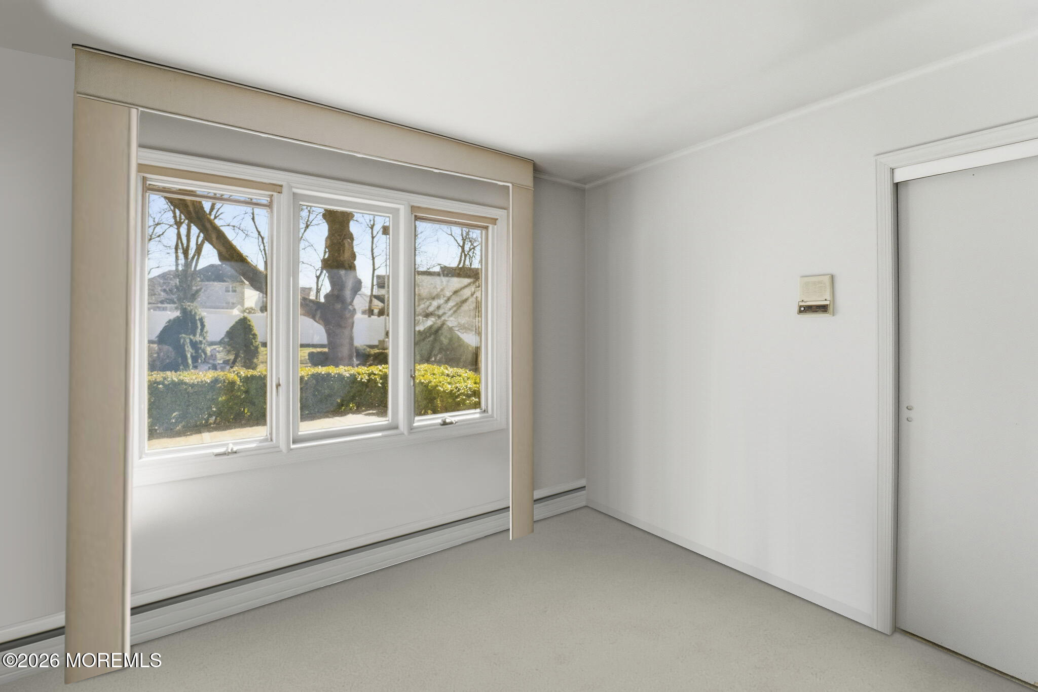 440 Broadway Road Freehold, NJ 07728 - Photo 32 of 50 an empty room with a window