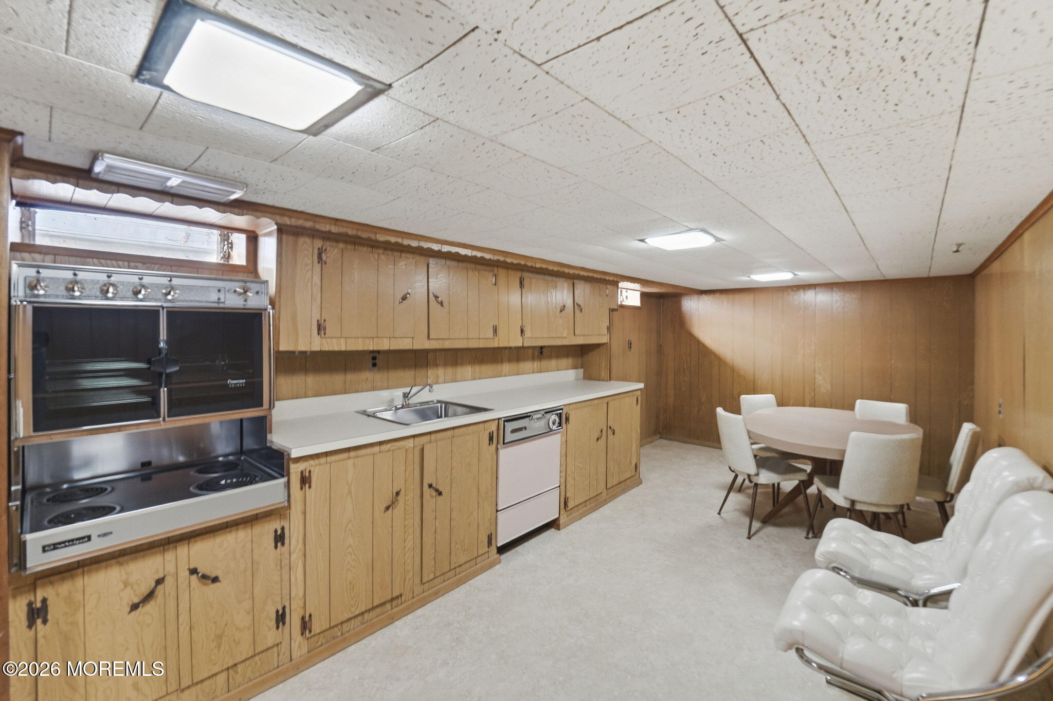 440 Broadway Road Freehold, NJ 07728 - Photo 41 of 50 a kitchen with a sink and cabinets