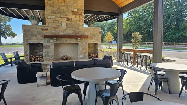 a view of water with a yard