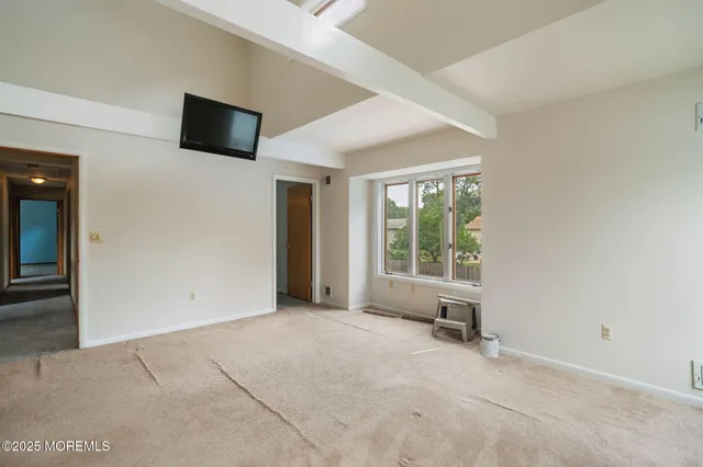 a view of a deck with chairs a barbeque with wooden floor and fence