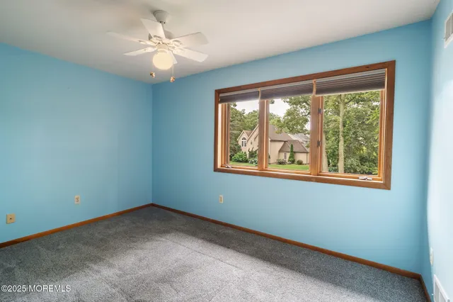 a view of a park with swings and slides