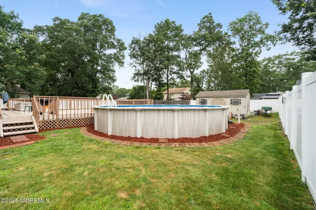 an aerial view of city and lake