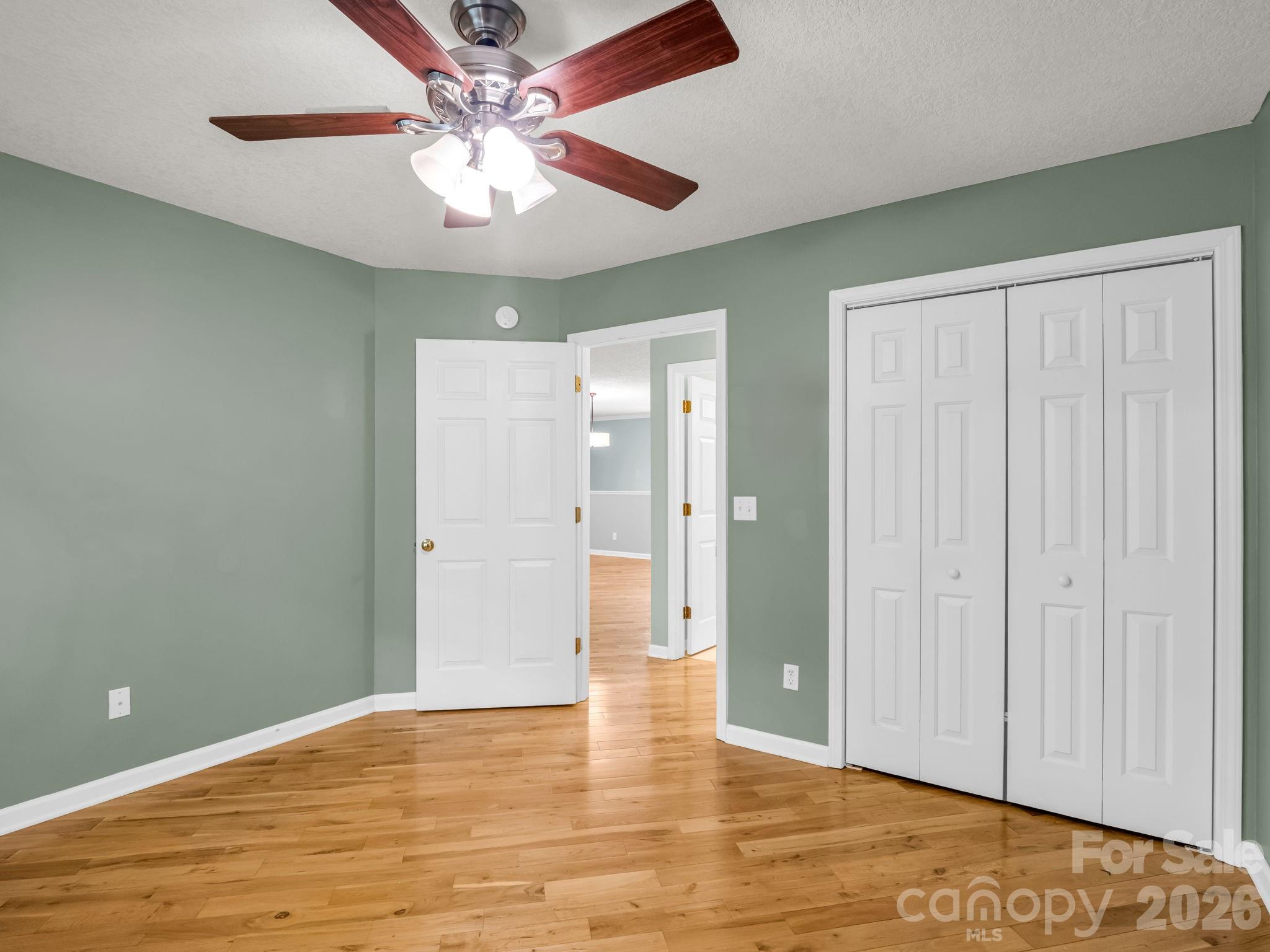 4 Rathfarnham Road, Unit 4F Asheville, NC 28803 - Photo 21 of 33 wooden floor in an empty room