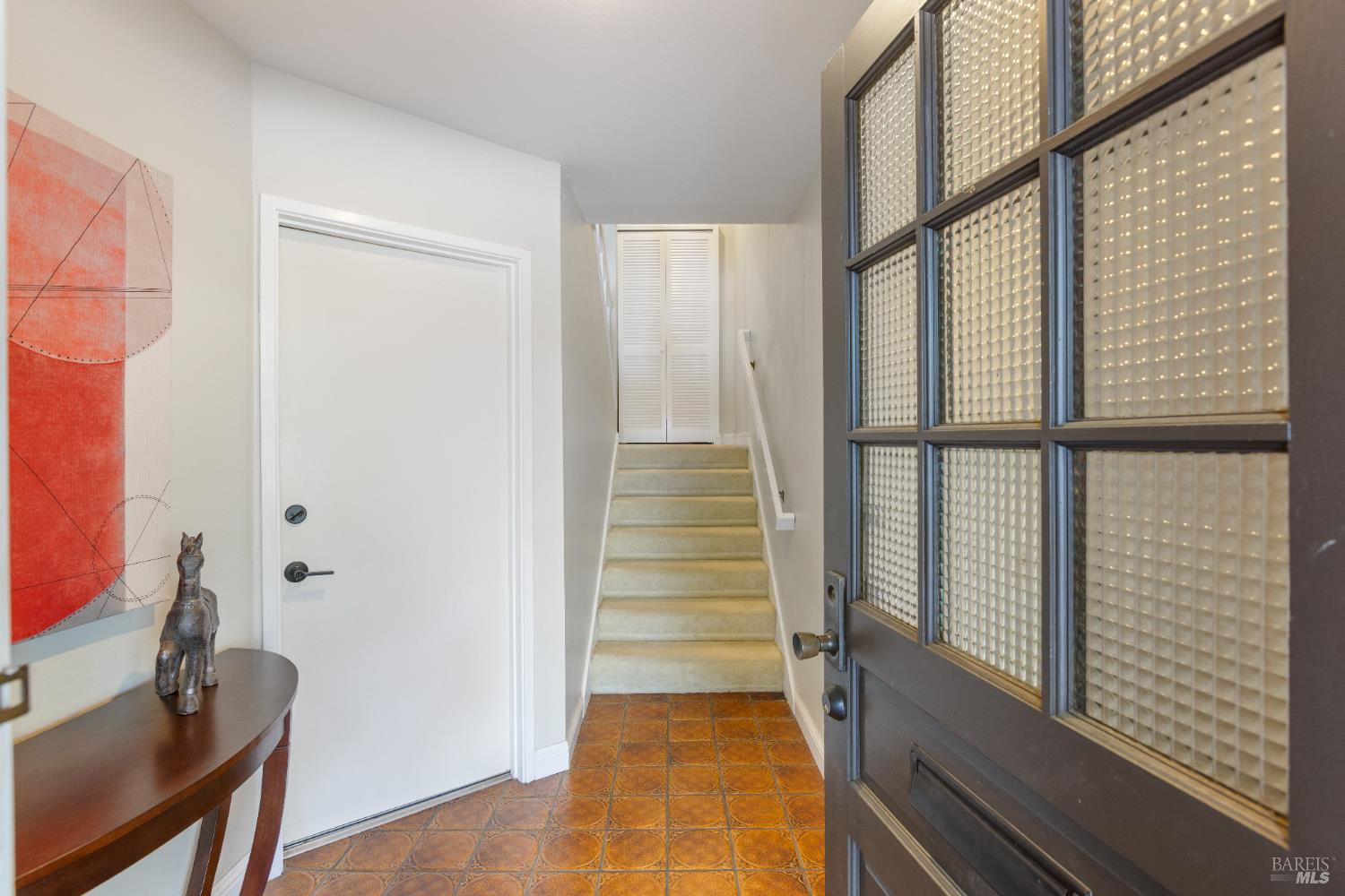 428 El Faisan Drive San Rafael, CA 94903 - Photo 2 of 48 a view of a hallway with wooden floor and windows