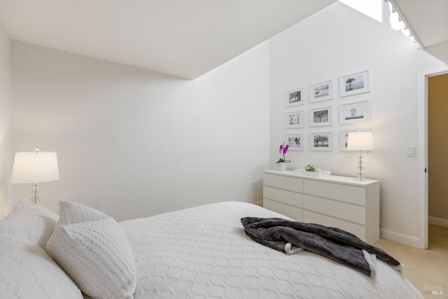 428 El Faisan Drive San Rafael, CA 94903 - Photo 25 of 48 a room with a bed and a window