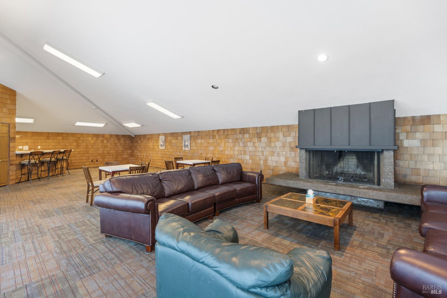 428 El Faisan Drive San Rafael, CA 94903 - Photo 39 of 48 a living room with furniture and a fireplace