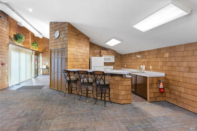 a view of room with window and furniture
