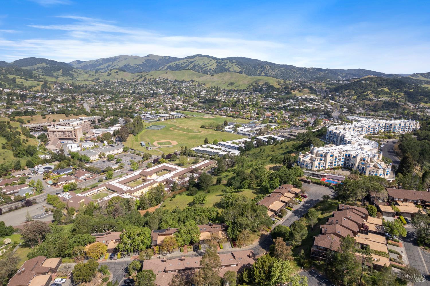 428 El Faisan Drive San Rafael, CA 94903 - Photo 45 of 48 an aerial view of residential houses with outdoor space and trees