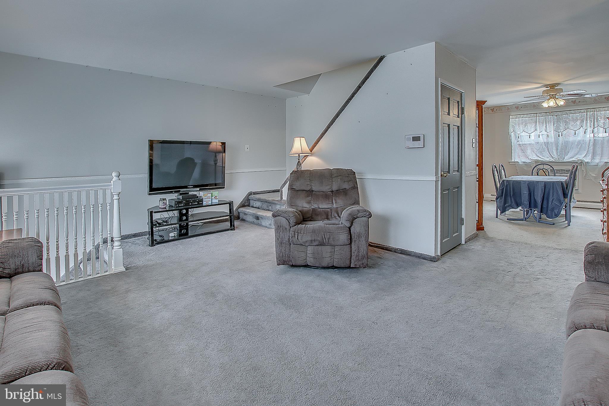 10932 East Keswick Road Philadelphia, PA 19154 - Photo 6 of 30 Living room stairs up view