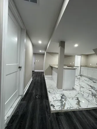 a view of kitchen with wooden floor